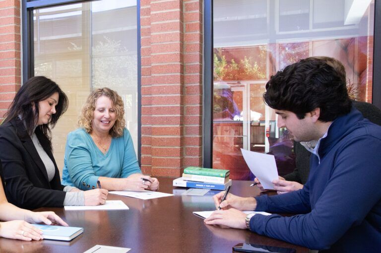 Casey, Jill, and Alex discussing numbers